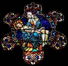 stain glass of the dead Christ with Mary